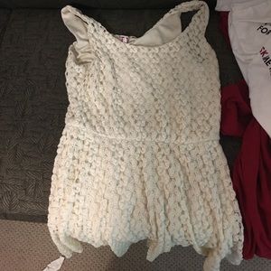 Lacy white sleeveless dress